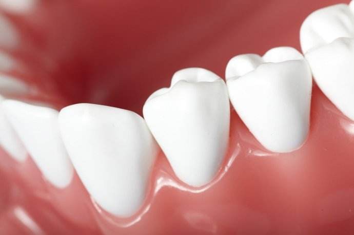 造成牙齿松动的原因及治疗方法是什么