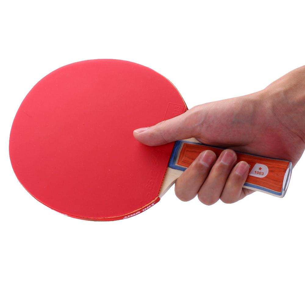 01乒乓球拍有正反胶面是为选手量身定做的,一般来说正胶是带颗粒击球
