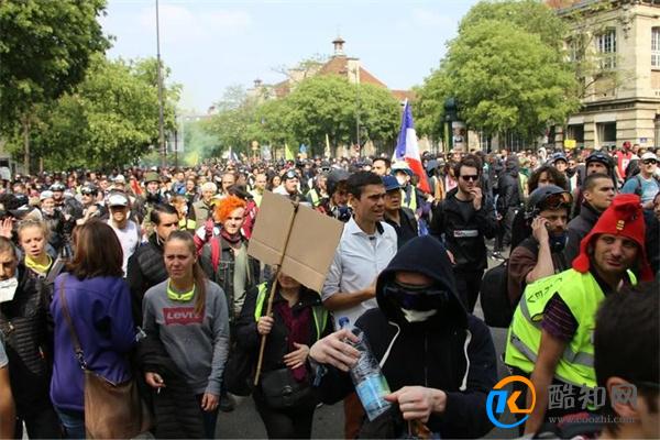 法国举行“五一”大游行 举行大游行的原因？